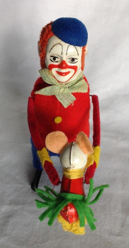 post WW2 German Schuco clock work wind up clown toy